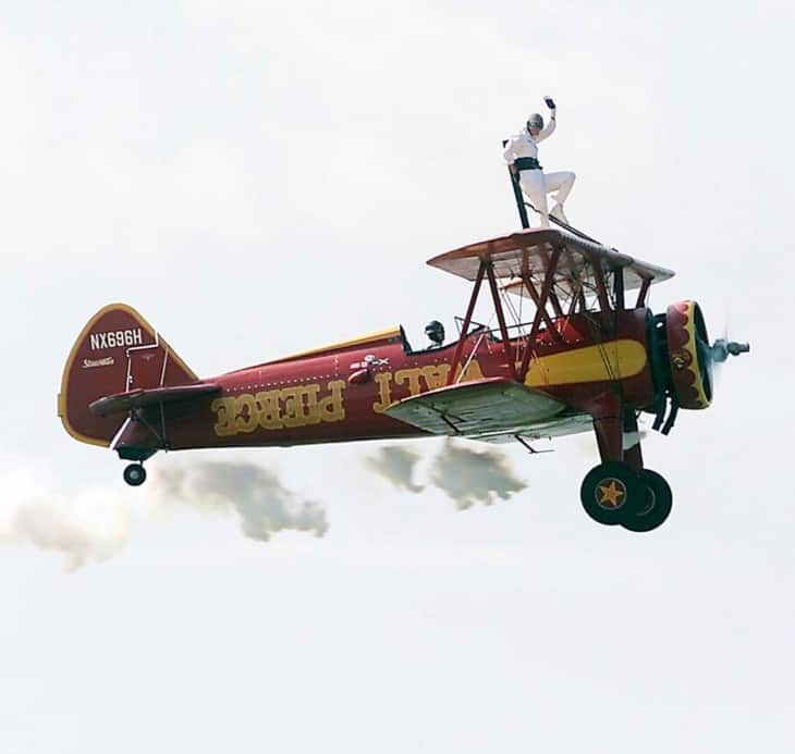 American Barnstormer Walt Pierce with Jenny Forsythe on the wing at the 314th Airlift Wing AW sponsored 2004 Heroes of the Heartland Air Show at Little Rock Air Force Base AFB Arkansas AR