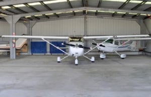 Cessna 172 in the foreground and Cessna 152 in the background