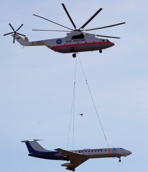 Russian MIL Mi-26 airlifting a plane