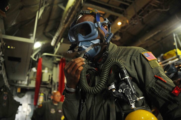 USAF Officer wearing a quick don oxygen mask